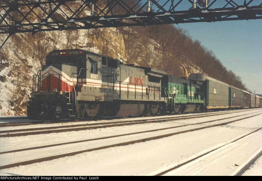 Westbound vehicle train drops racks